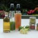 A group of glass bottles on a table